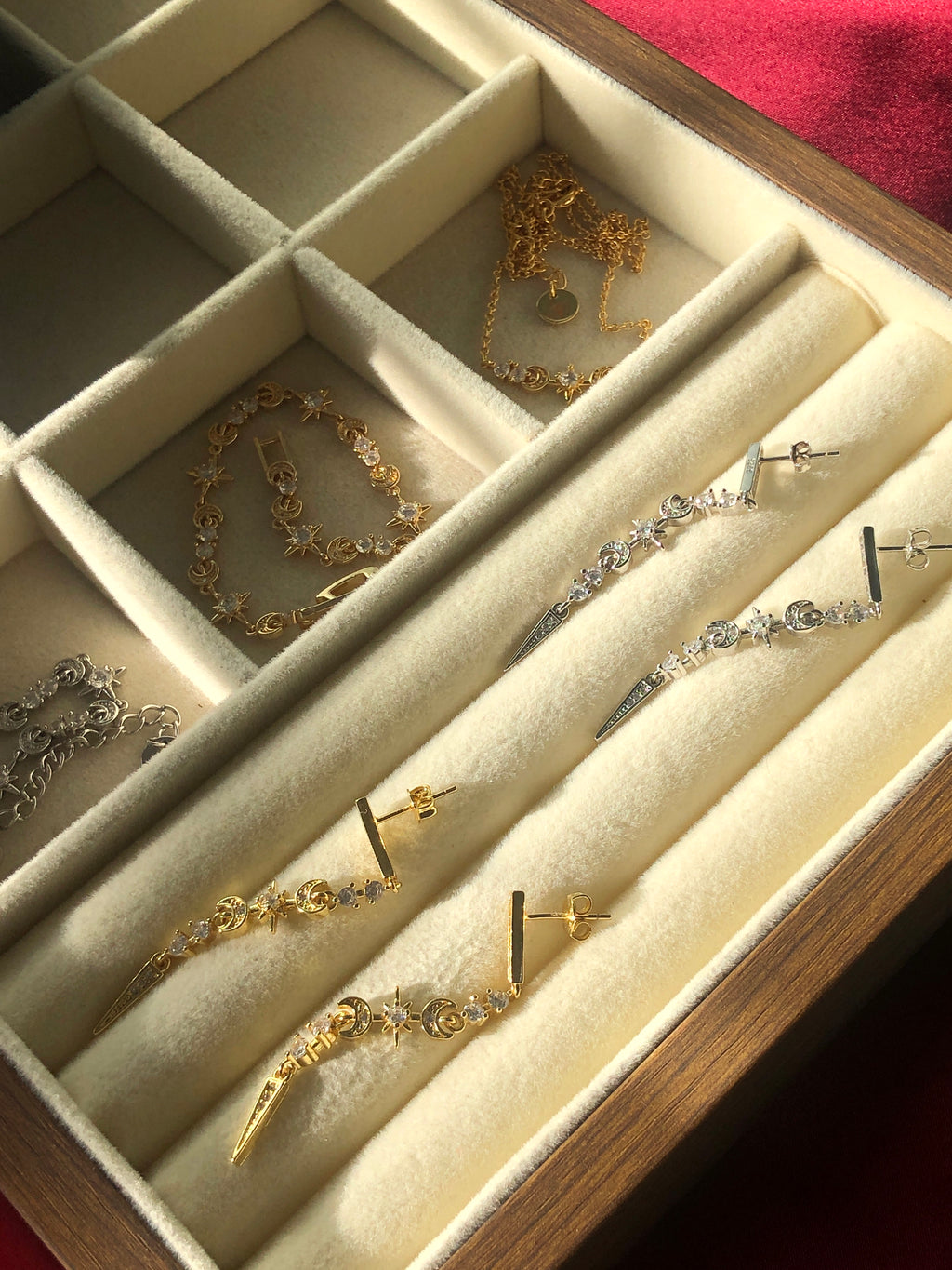 Jewelry box with gold and sterling silver celestial earrings